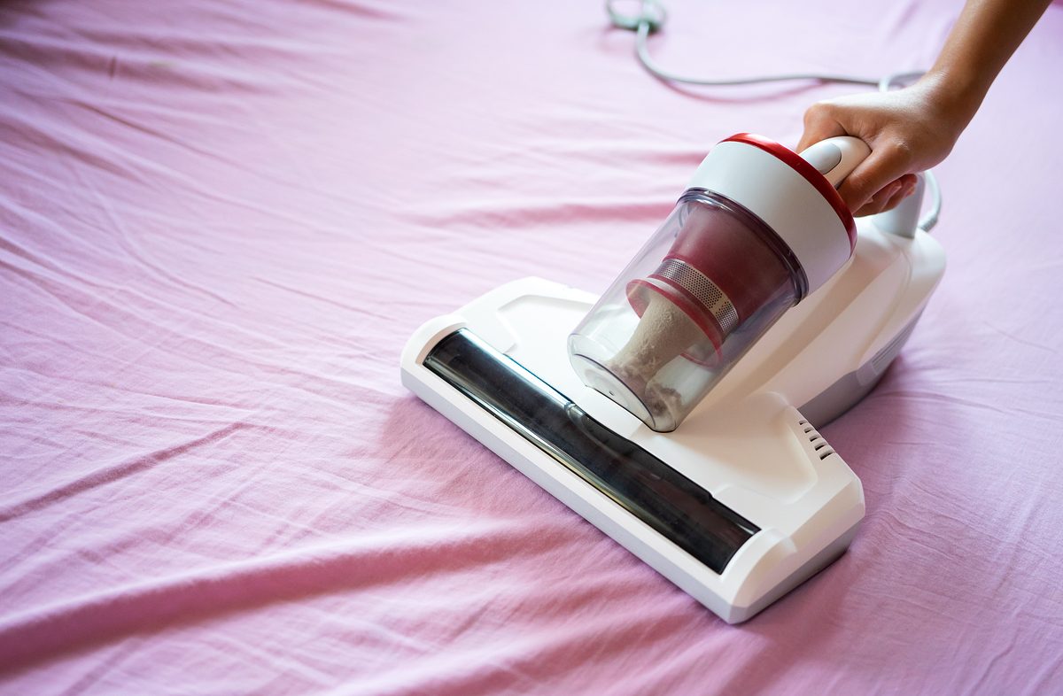 Vacuum cleaners and germicidal dust mites by using UV light to clean on all beds, sofas and bedding. Health care concept House cleaning And good health